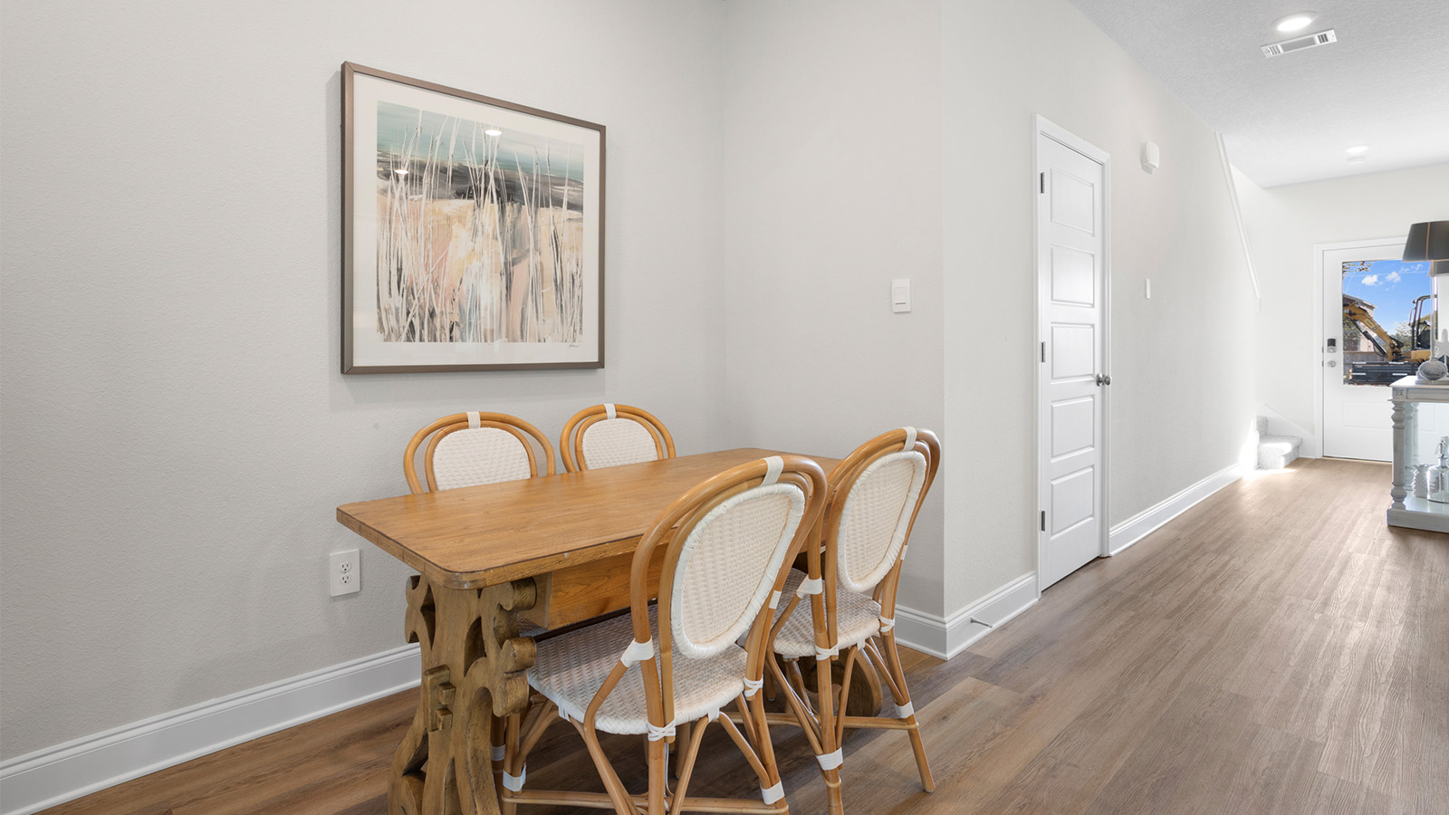 This compact dining nook is perfectly placed in a new home on the Mississippi Gulf Coast.