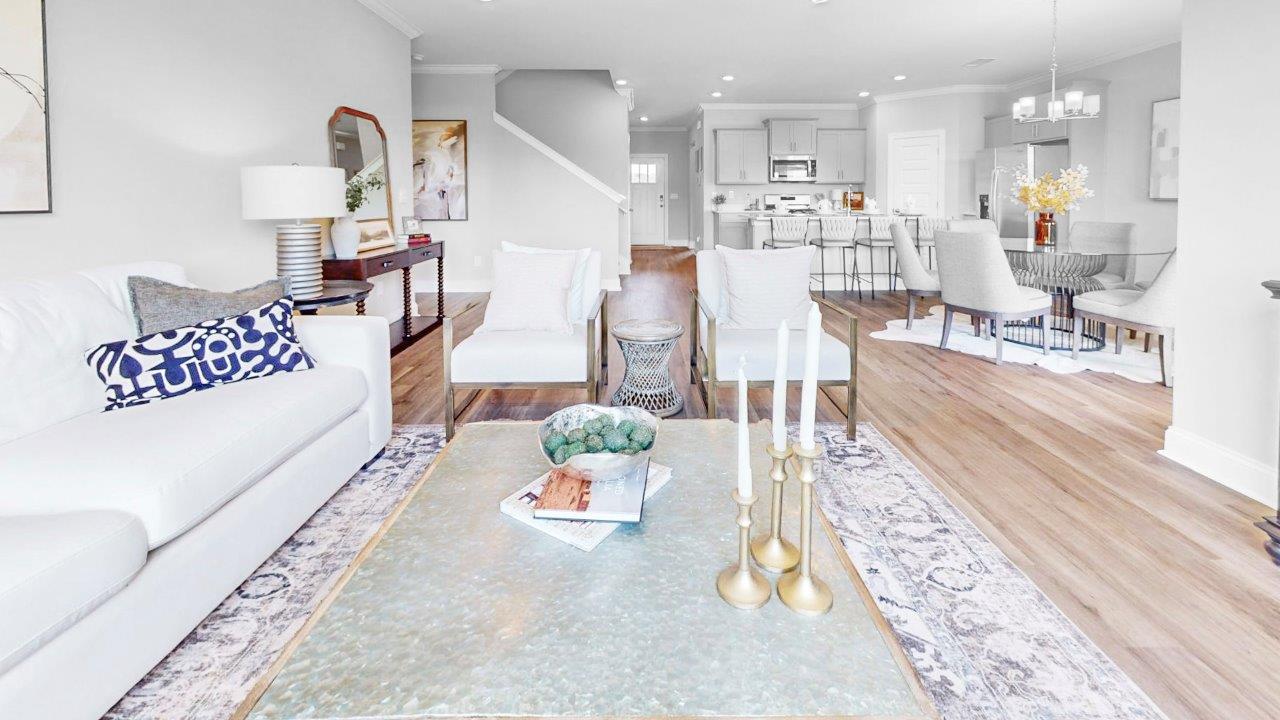 Open family room with abundant natural light and LVP throughout