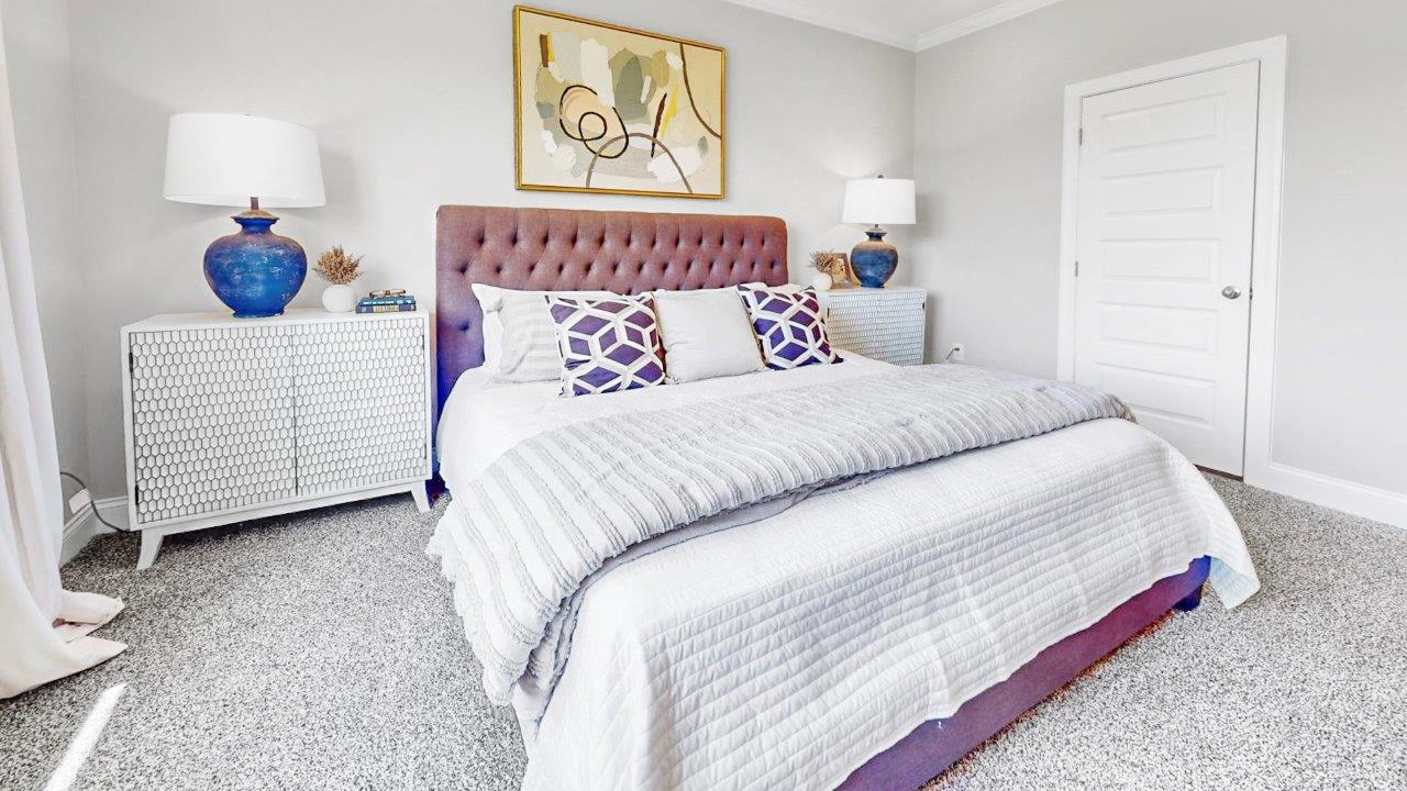 Large primary suite with walk in closet and private bath