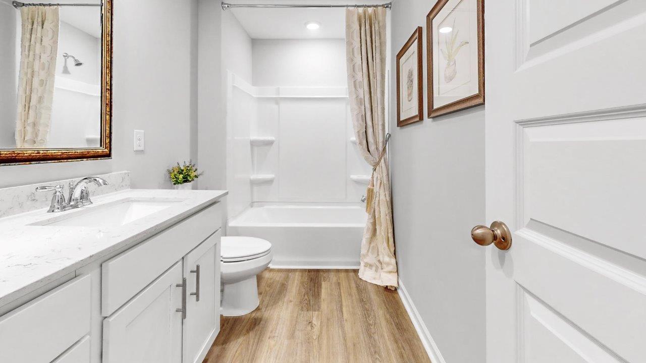 Carroll floorplan with LVP Flooring, Quartz countertops, and SmartHome technology