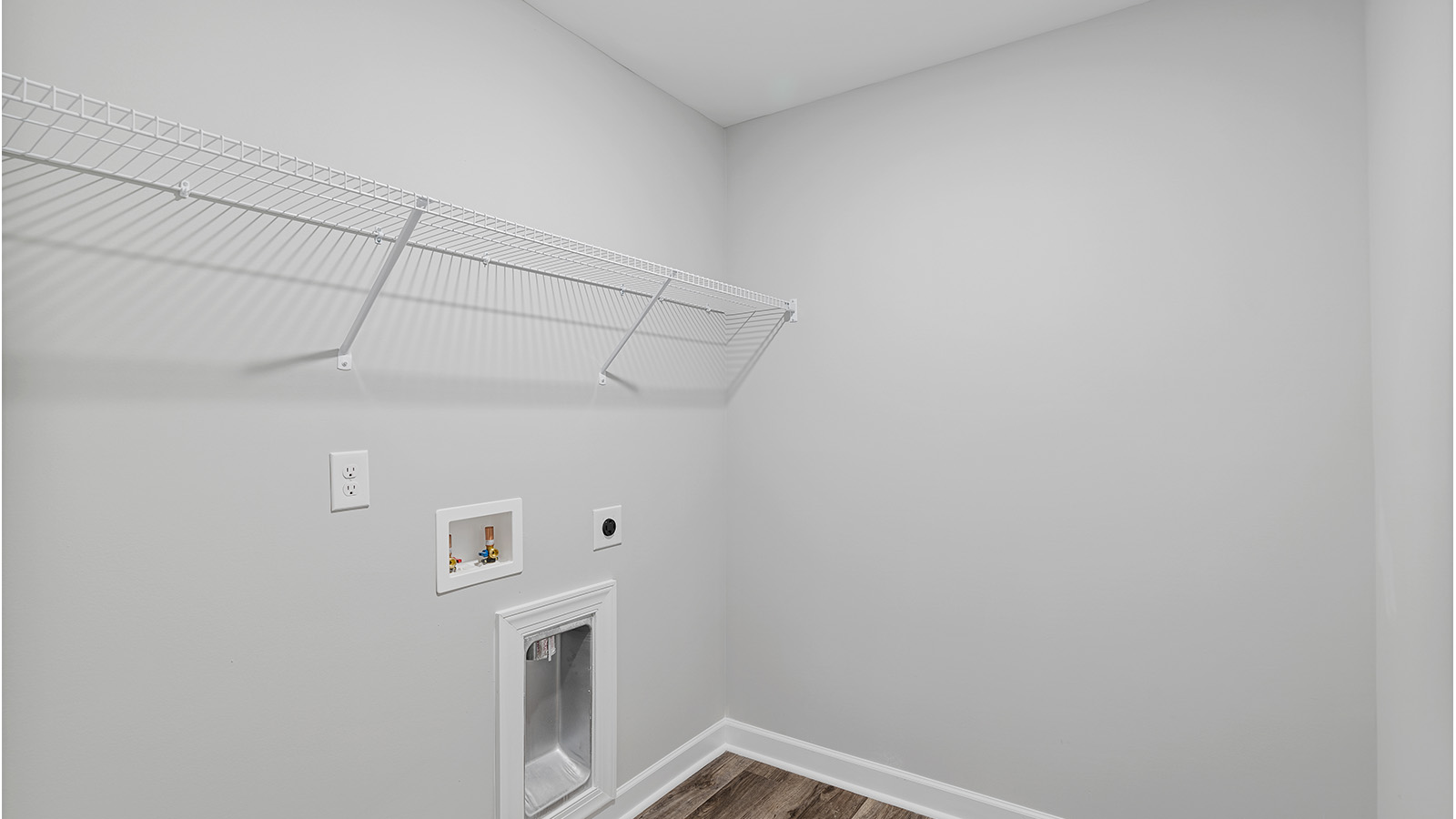 laundry room with luxury vinyl plank flooring