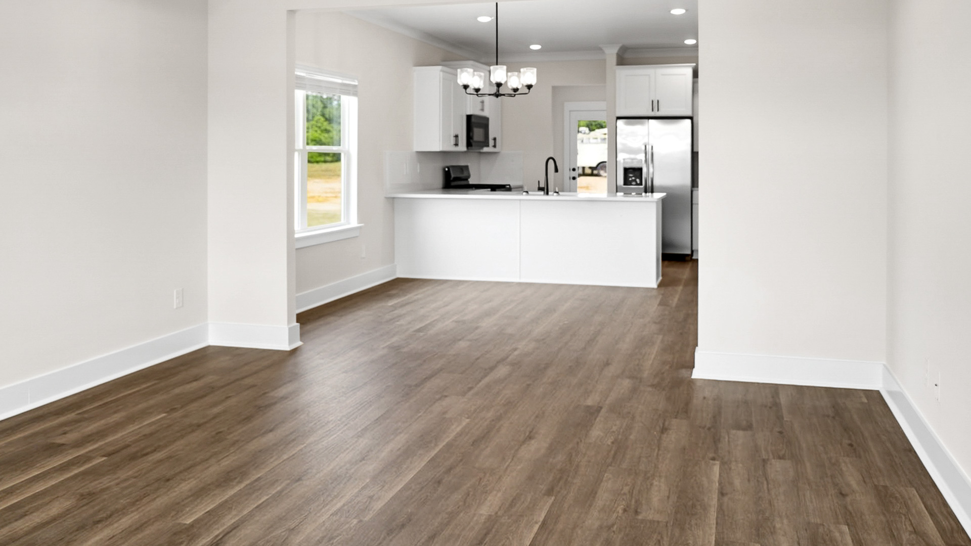 The Jackson floorplan with 9ft. ceilings, LVP flooring, and quartz countertops.