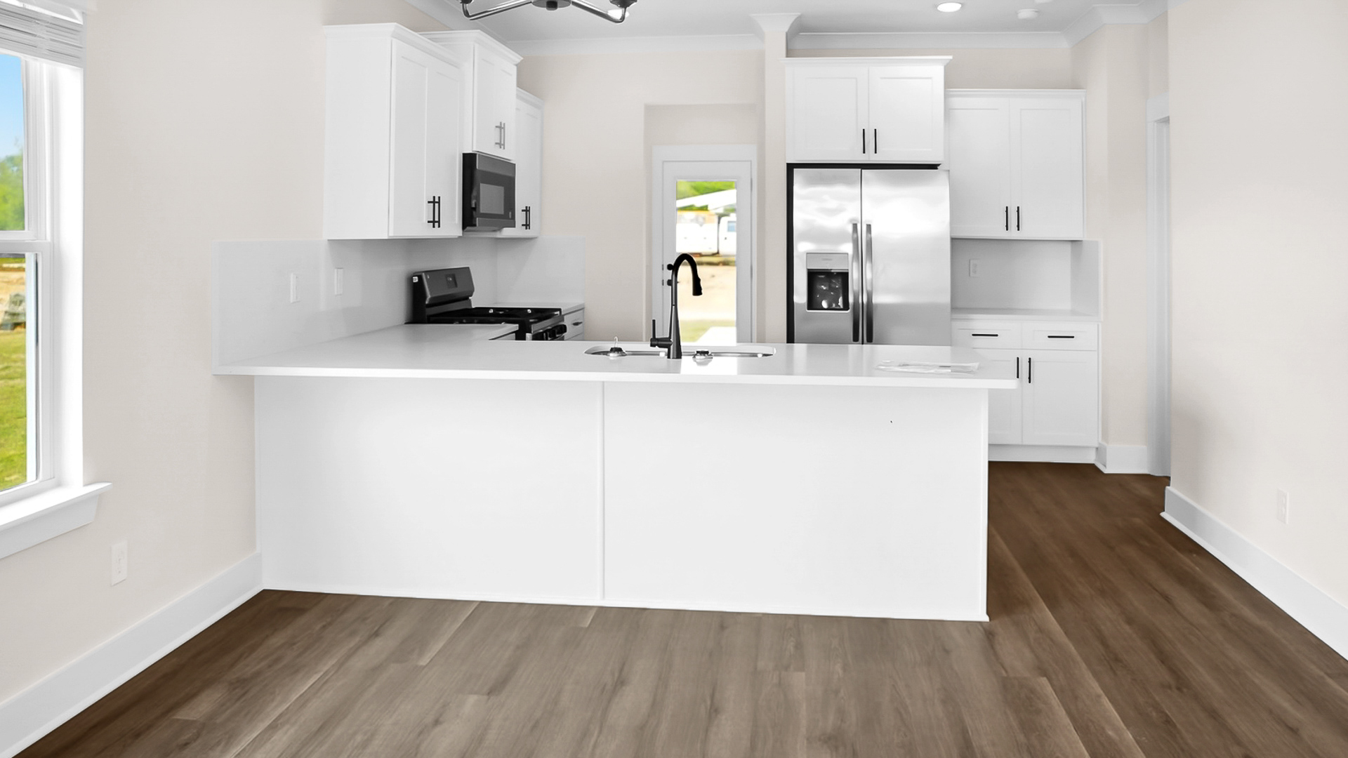 The Jackson floorplan with 9ft. ceilings, LVP flooring, and quartz countertops.