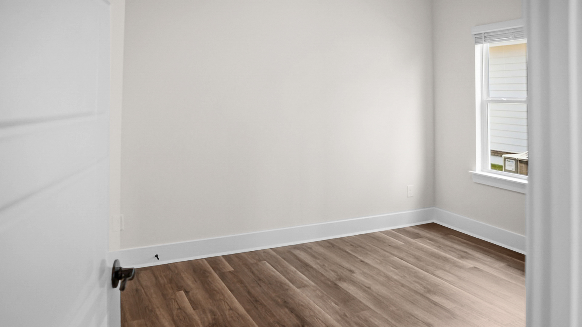 The Jackson floorplan with 9ft. ceilings, LVP flooring, and quartz countertops.
