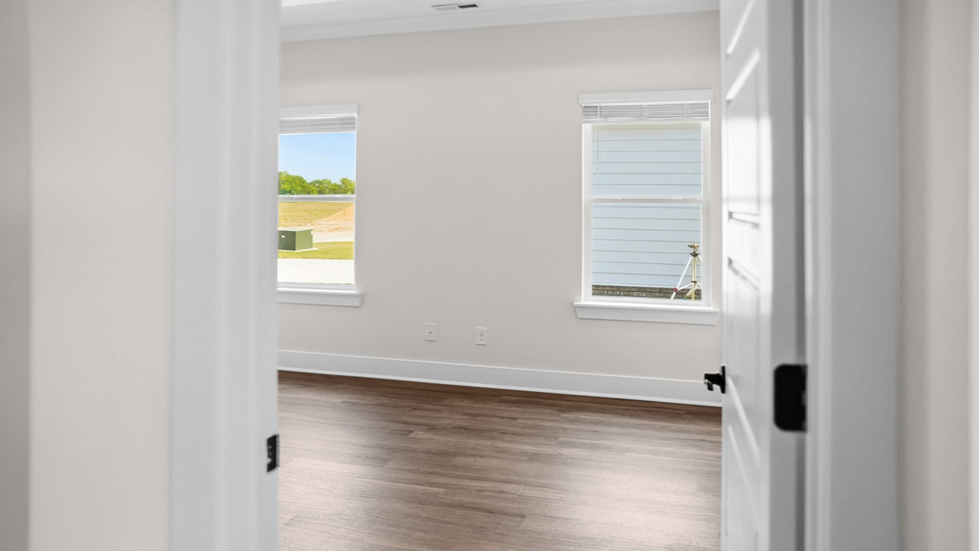 The Jackson floorplan with 9ft. ceilings, LVP flooring, and quartz countertops.