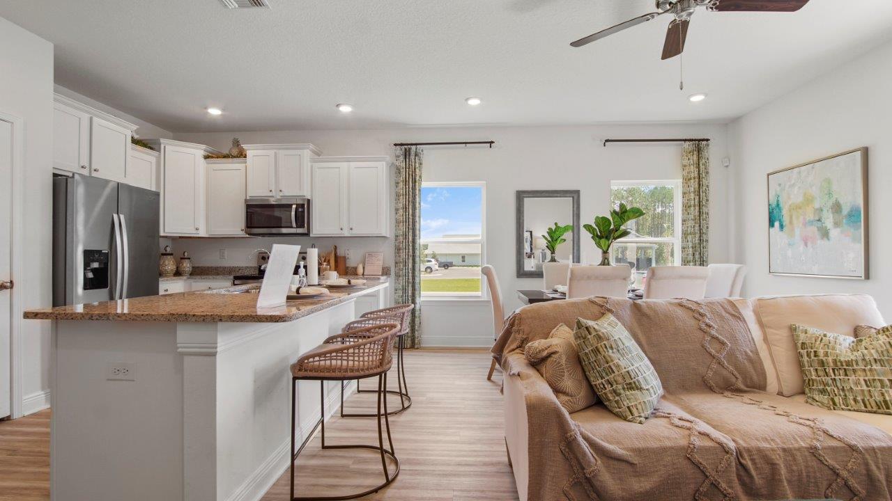 Bright living space featuring durable LVP and an easy, open layout.