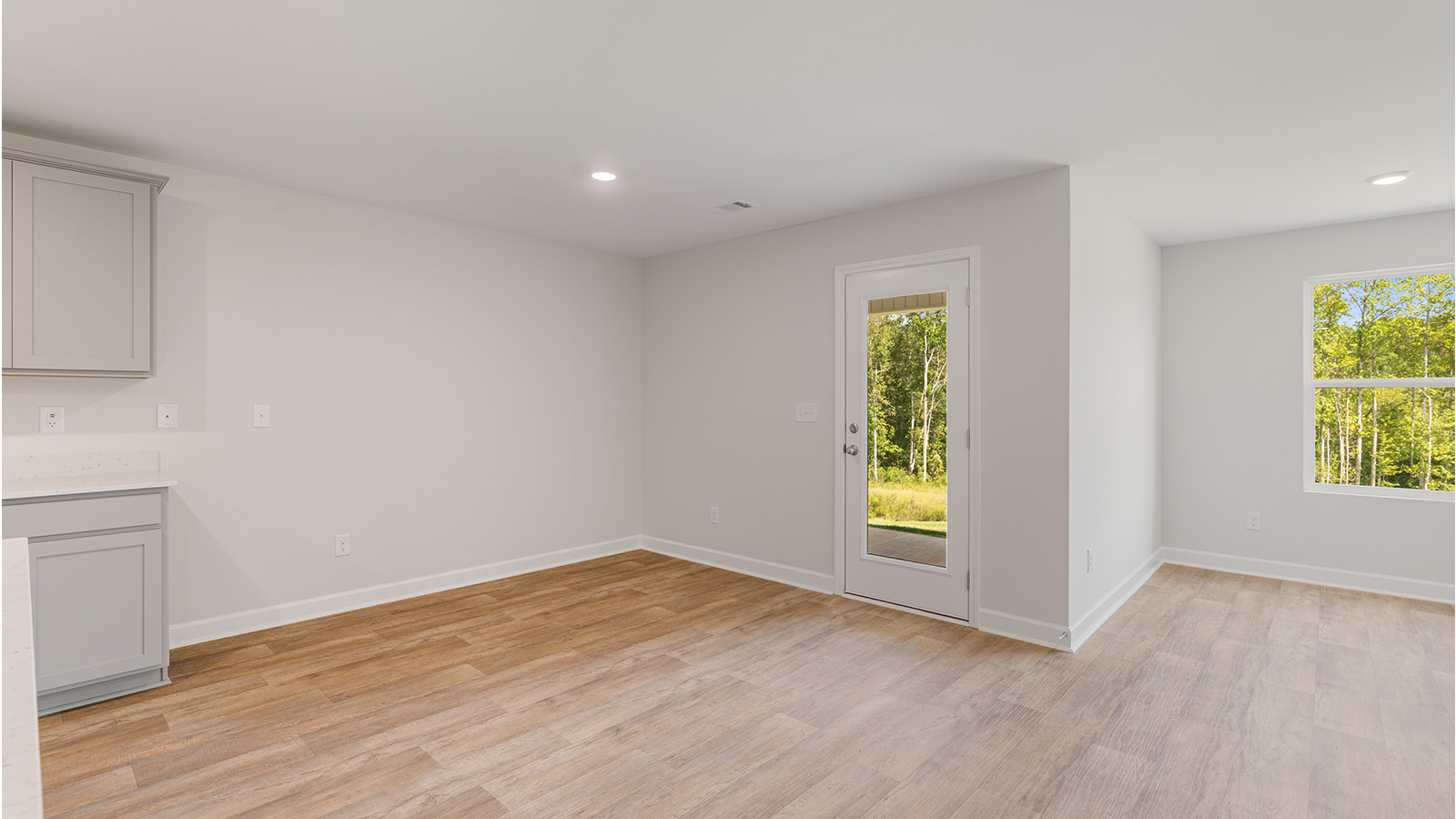 Spacious living room designed for entertaining with an open floorplan.