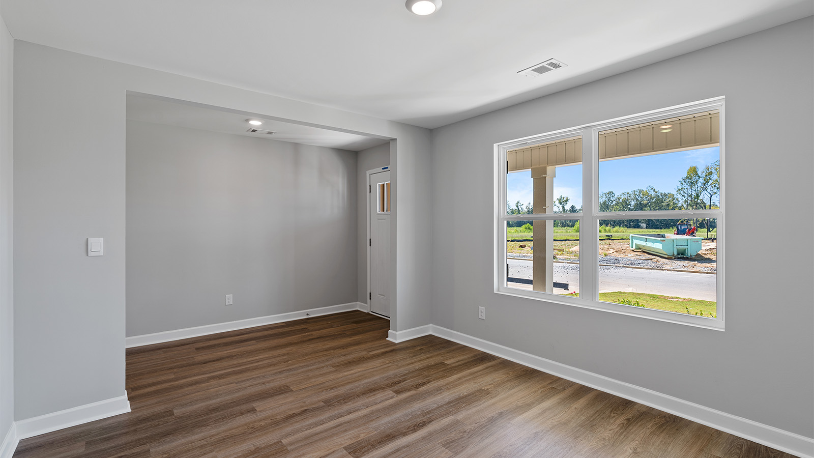 The Hayden interior, luxury plank vynl flooring and natural lighting