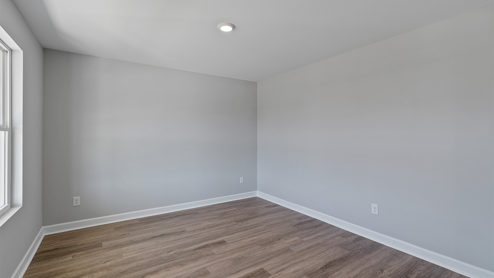 The Hayden interior, luxury plank vynl flooring and natural lighting