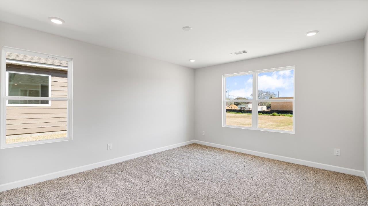 Belfort floorplan with quartz counter tops,, open concept living, and lvp flooring in all wet areas