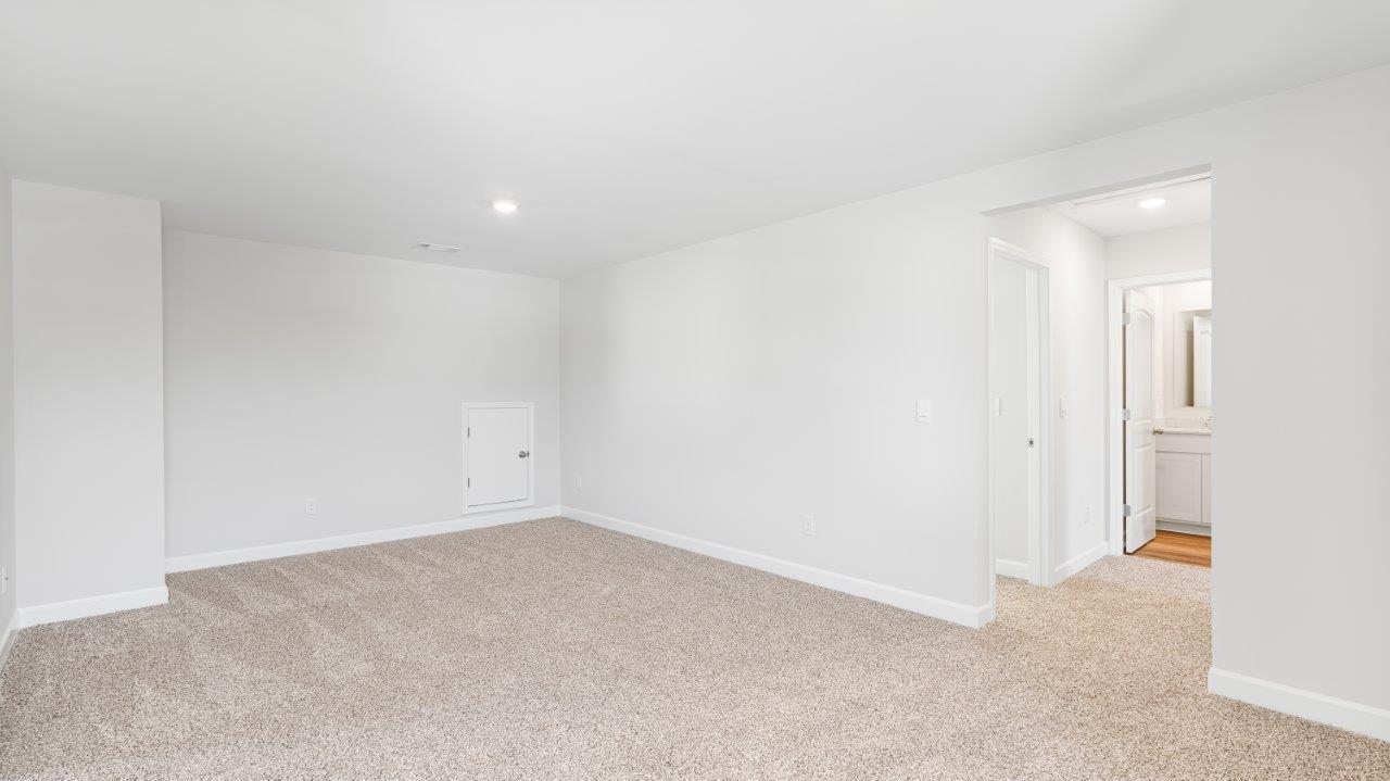 Belfort floorplan with quartz counter tops,, open concept living, and lvp flooring in all wet areas