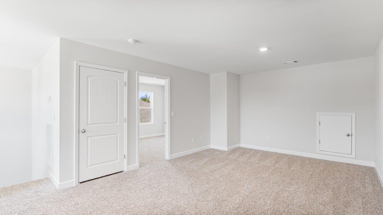 Belfort floorplan with quartz counter tops,, open concept living, and lvp flooring in all wet areas