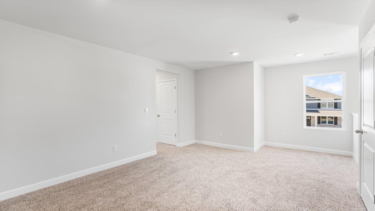 Belfort floorplan with quartz counter tops,, open concept living, and lvp flooring in all wet areas