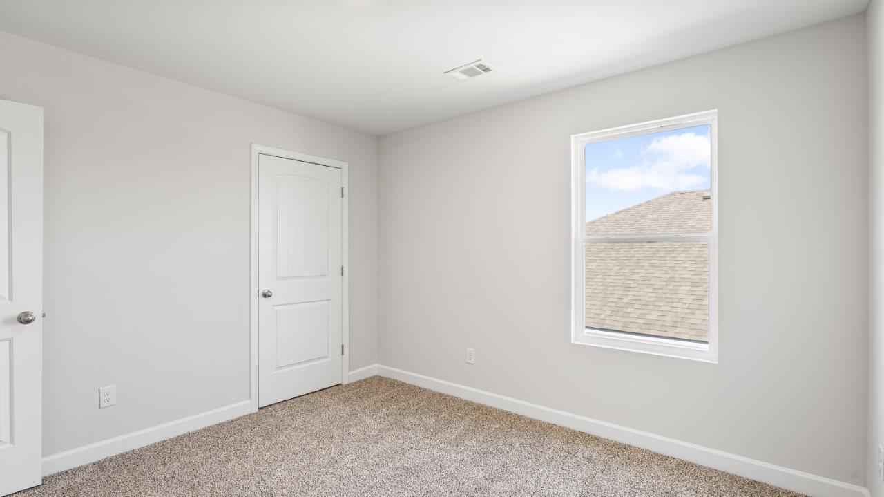 Belfort floorplan with quartz counter tops,, open concept living, and lvp flooring in all wet areas