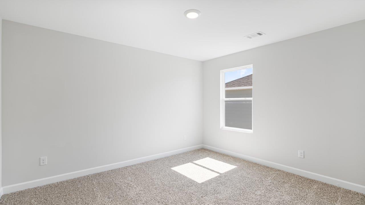 Belfort floorplan with quartz counter tops,, open concept living, and lvp flooring in all wet areas