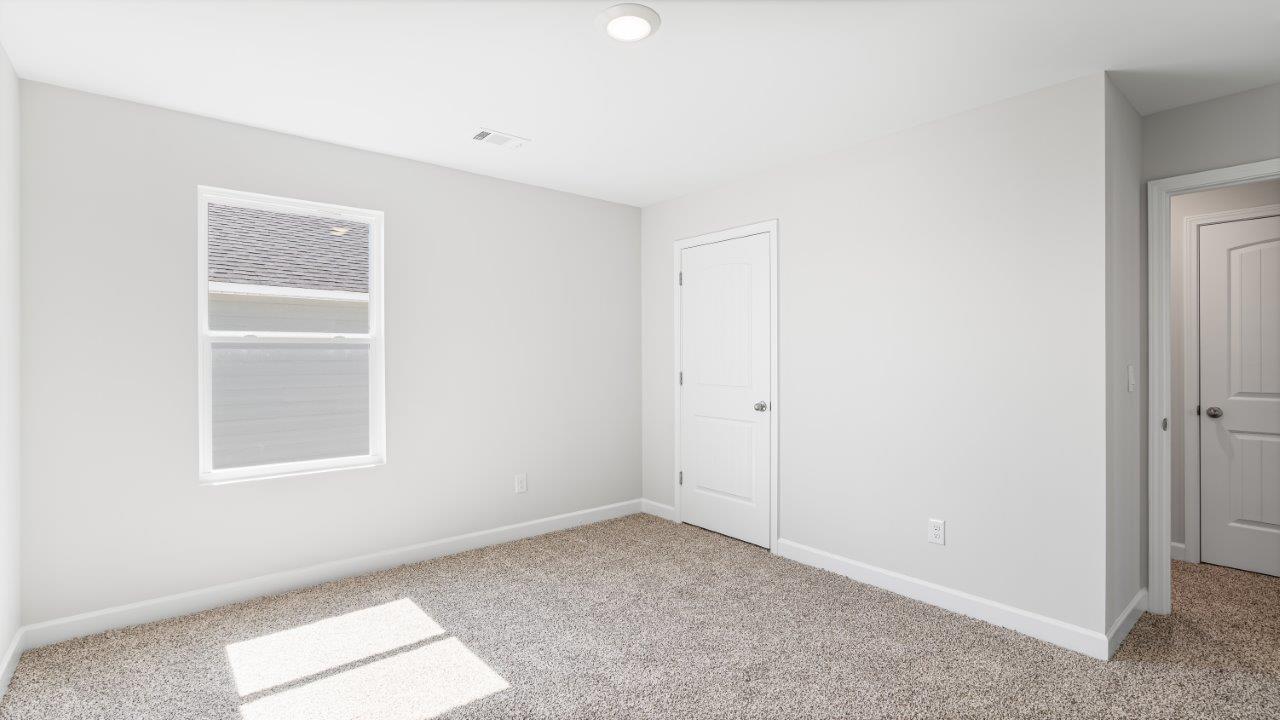 Belfort floorplan with quartz counter tops,, open concept living, and lvp flooring in all wet areas