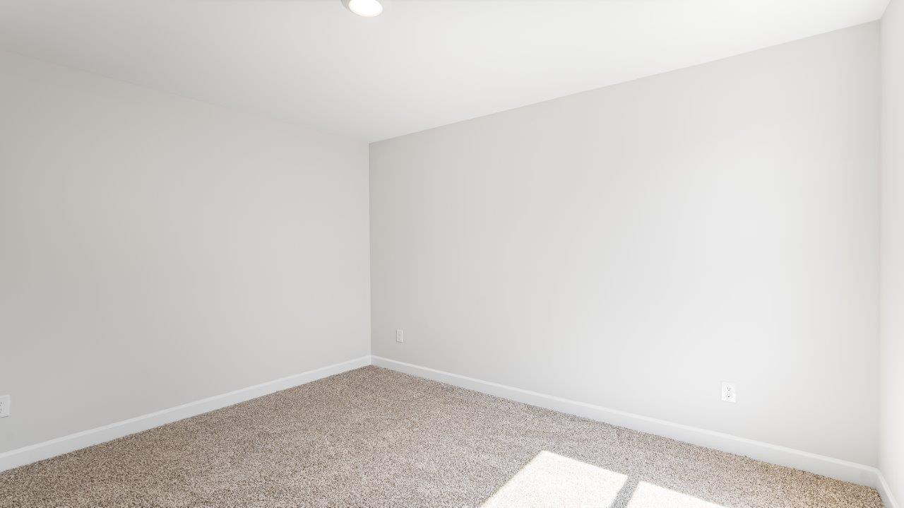 Belfort floorplan with quartz counter tops,, open concept living, and lvp flooring in all wet areas