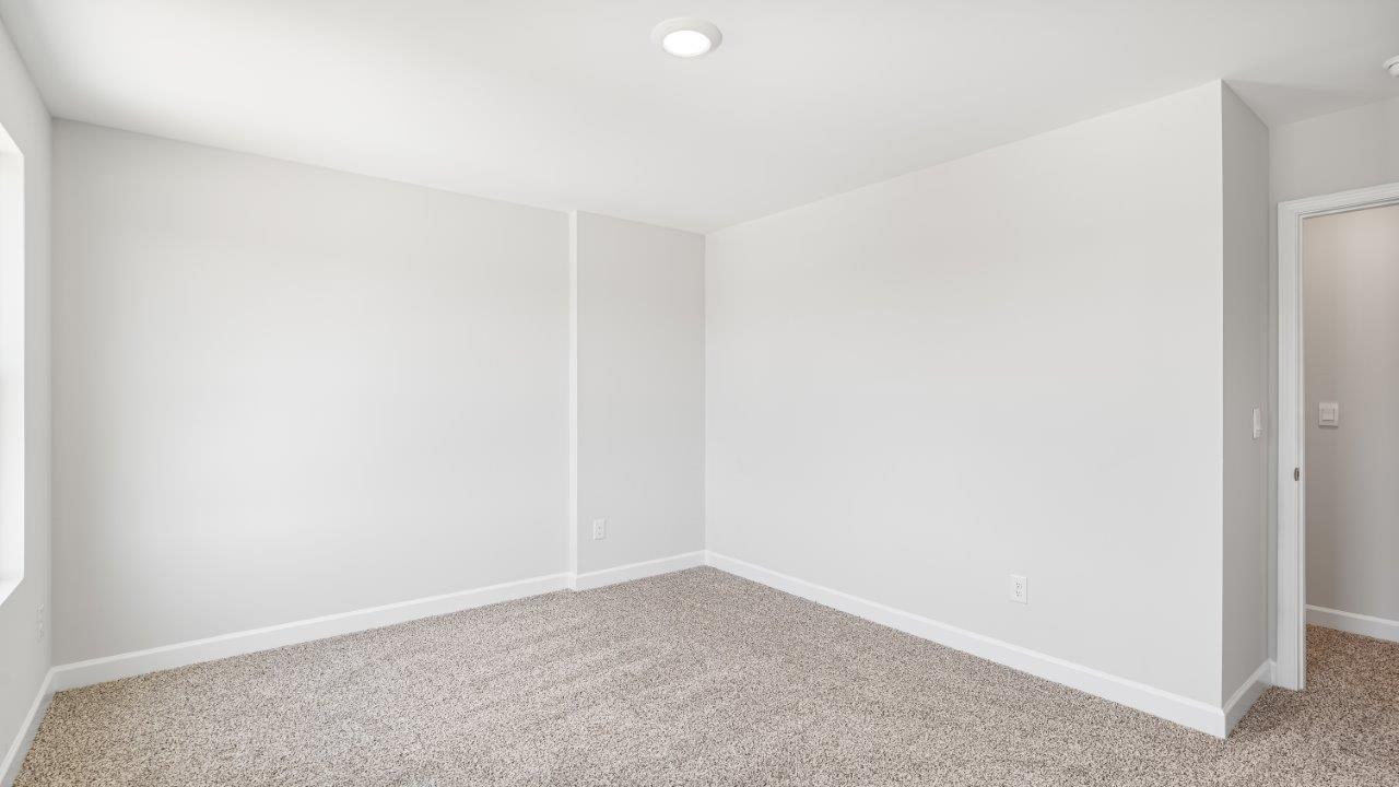 Belfort floorplan with quartz counter tops,, open concept living, and lvp flooring in all wet areas