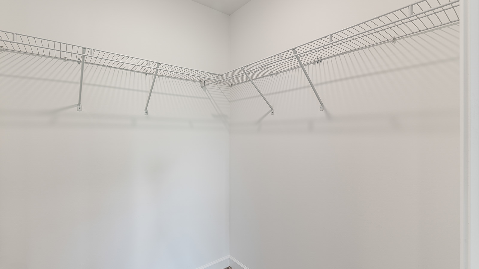 Interior photo of a closet in a freeport floorplan home.