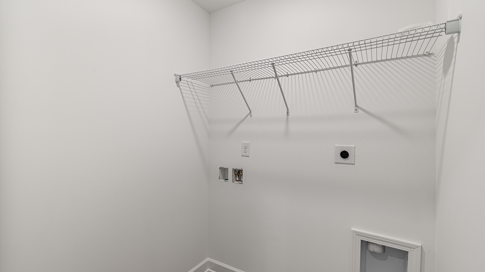 Interior photo of a closet in a freeport floorplan home.