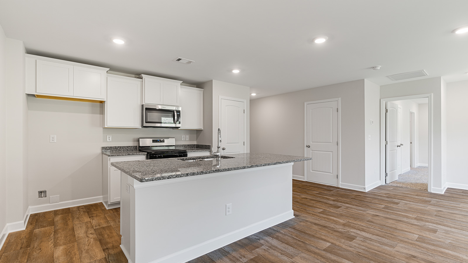 Interior photo of the kitchen area of a freeport floorplan home.