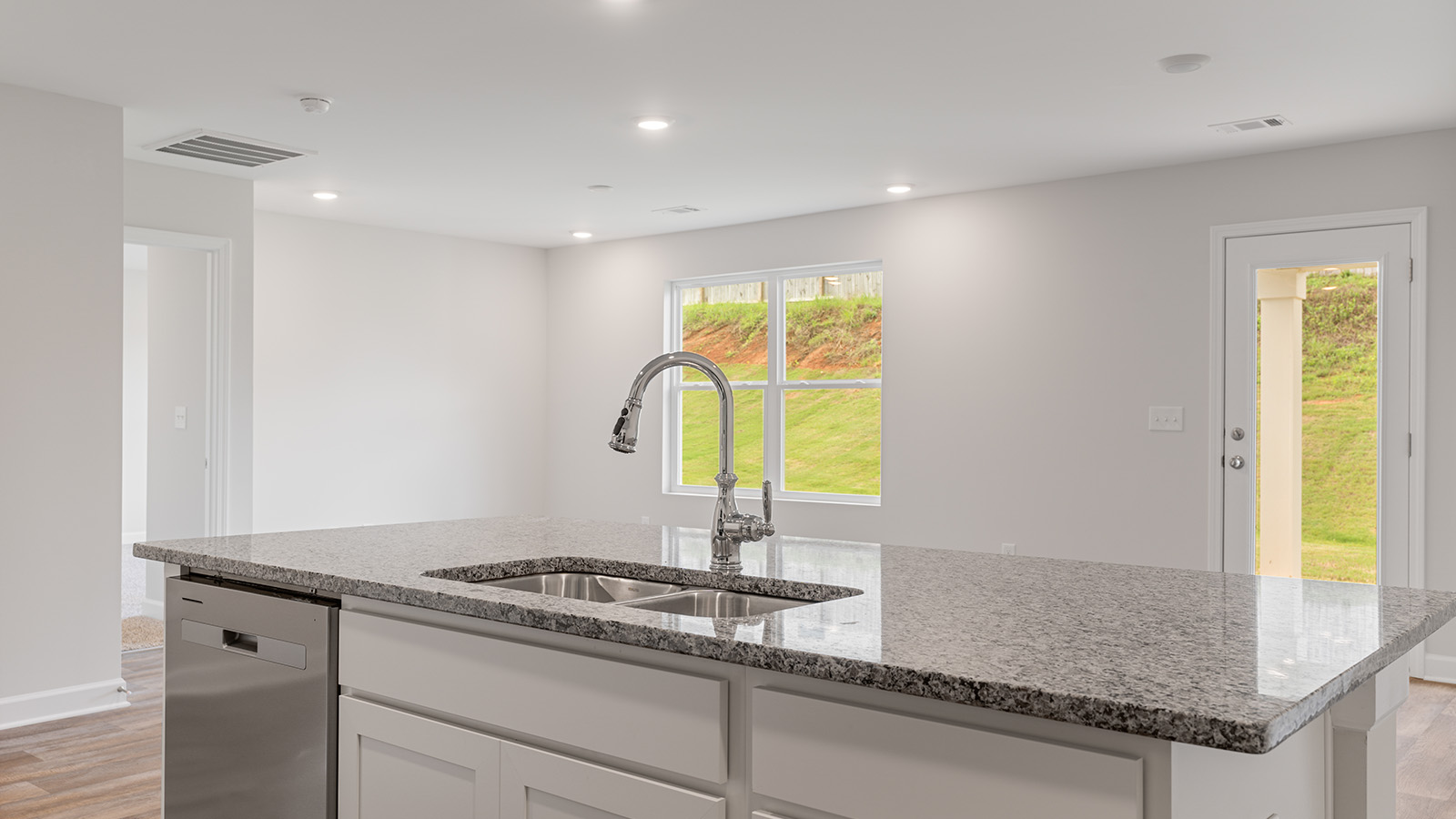 Interior photo of the kitchen area of a freeport floorplan home.