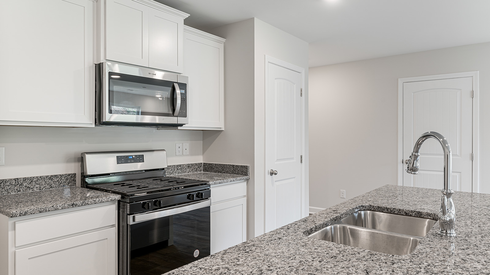 Interior photo of the kitchen area of a freeport floorplan home.