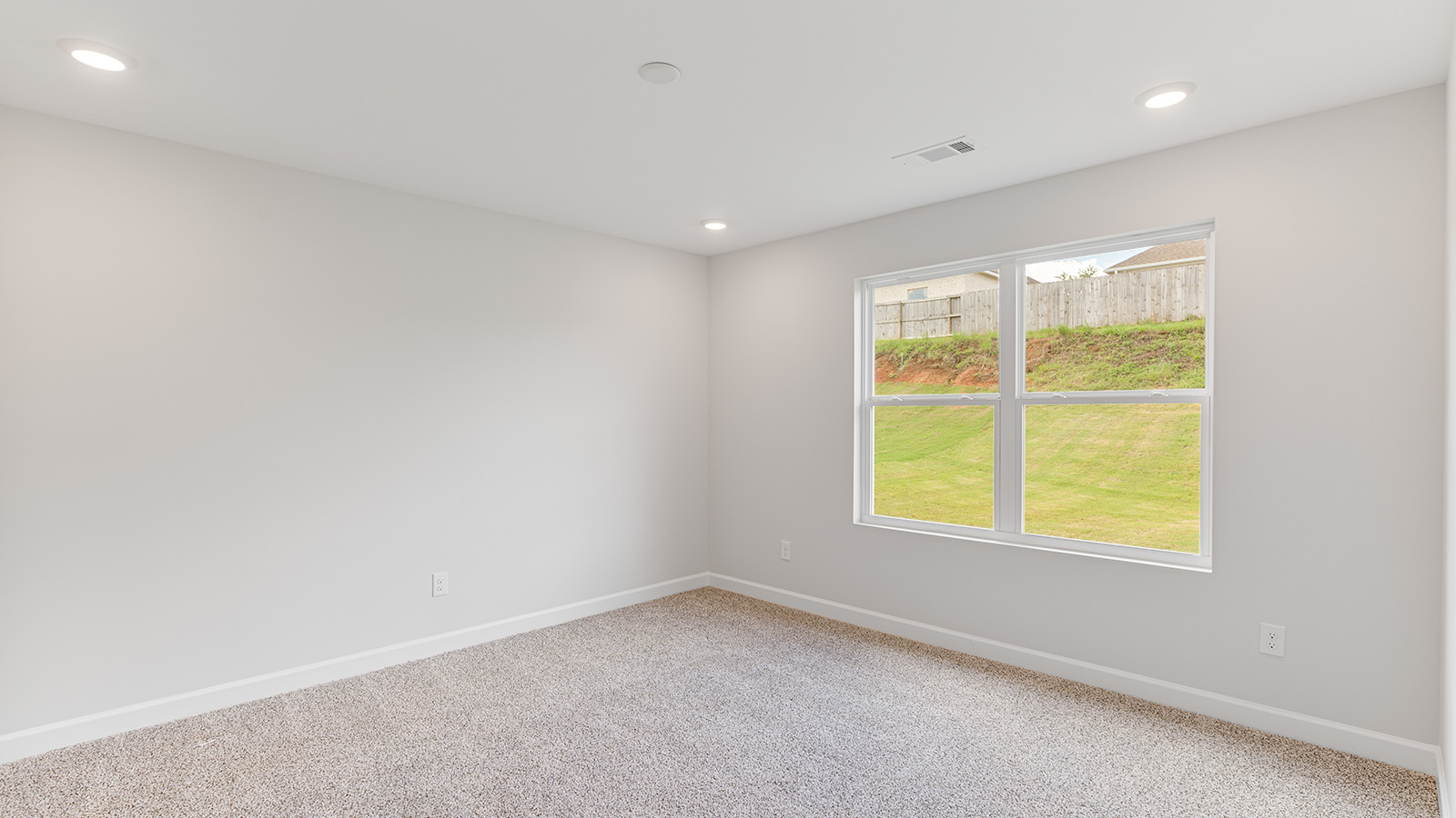 Interior photo of a bedroom in a  freeport floorplan home.