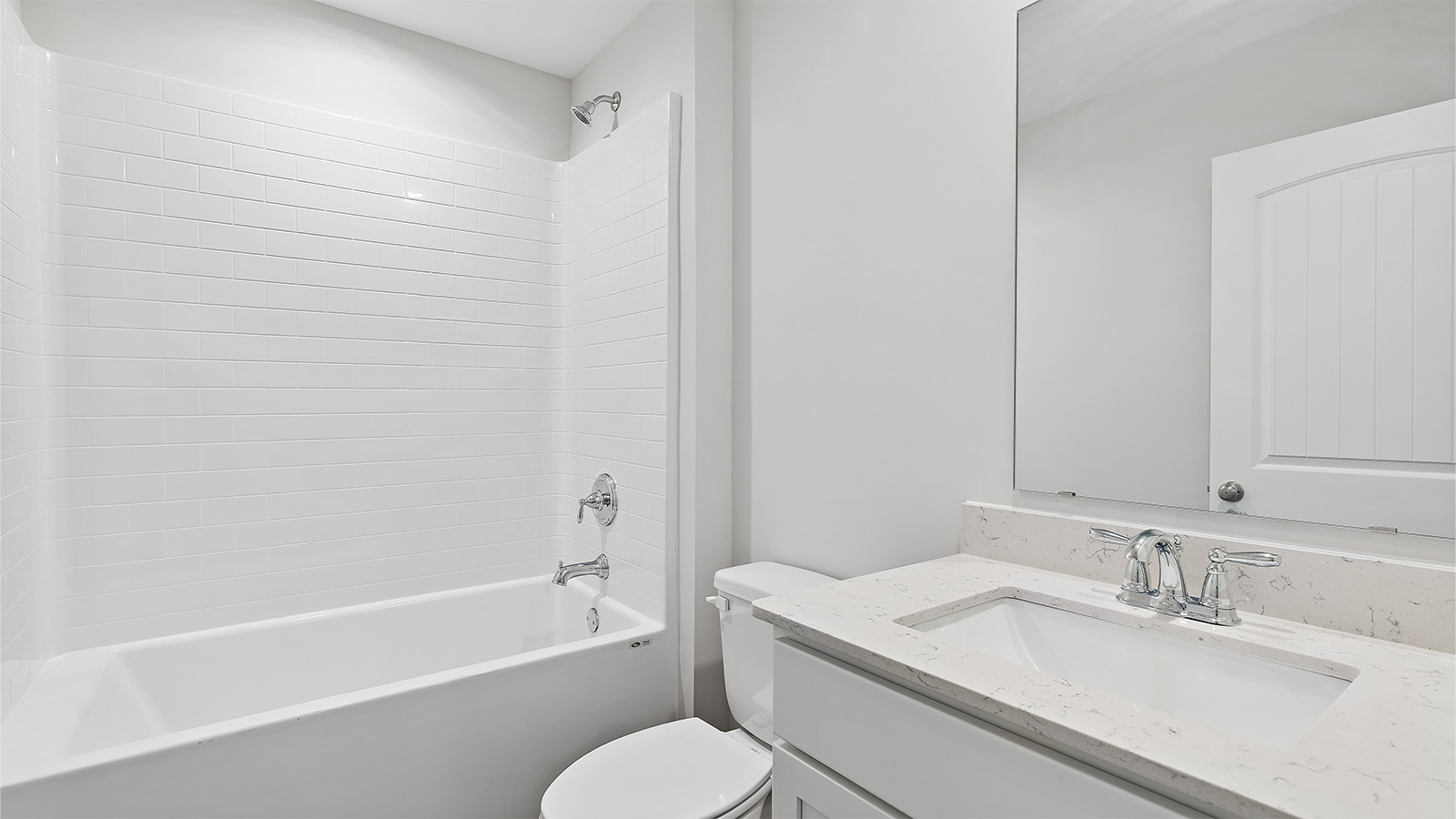 luxury vinyl plan flooring in bathrooms with quartz countertops