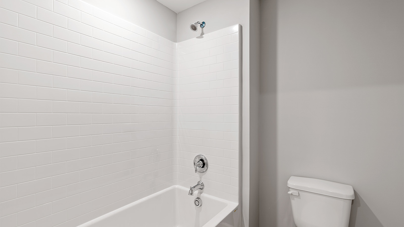 luxury vinyl plan flooring in bathrooms with quartz countertops