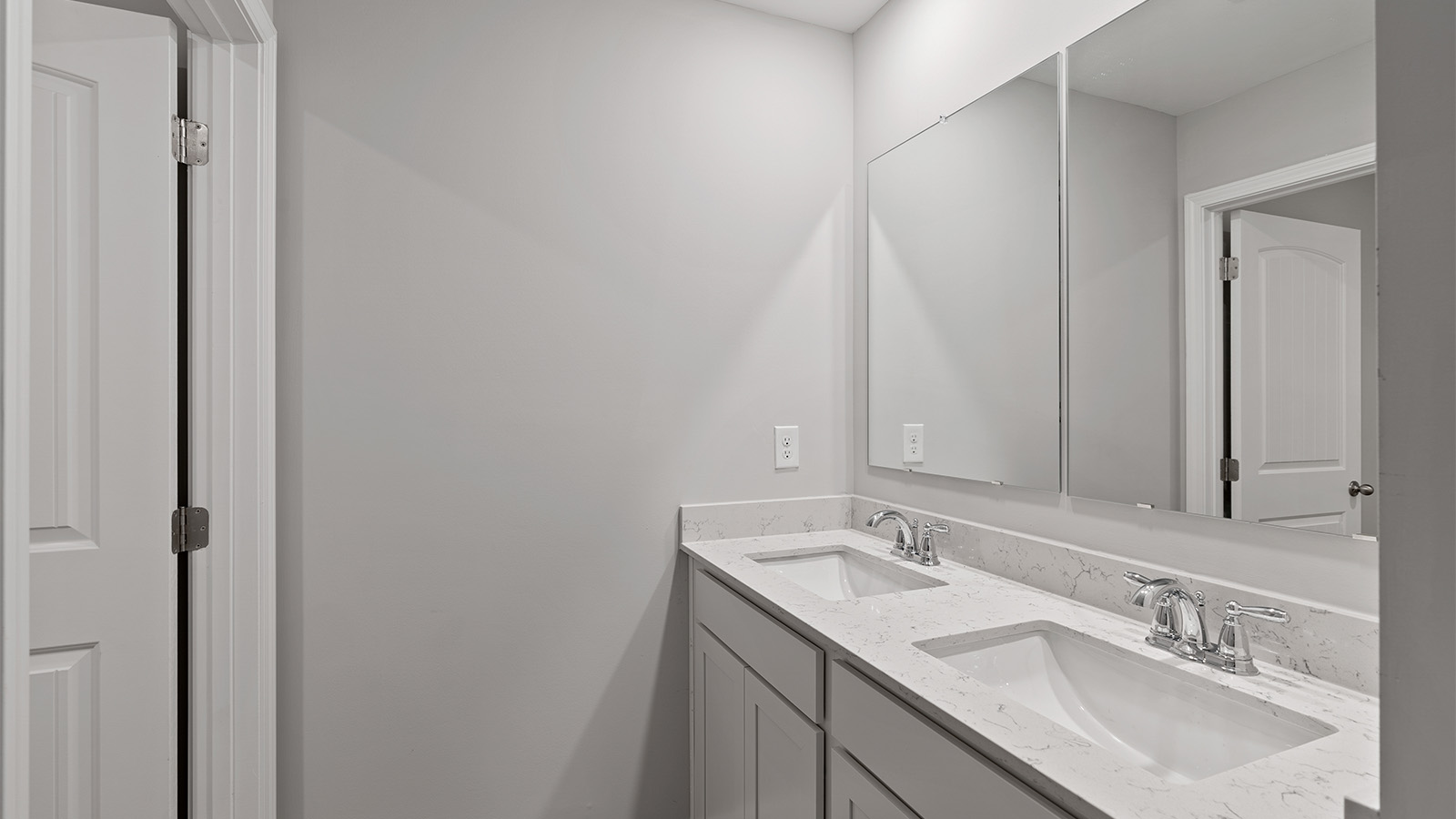luxury vinyl plan flooring in bathrooms with quartz countertops
