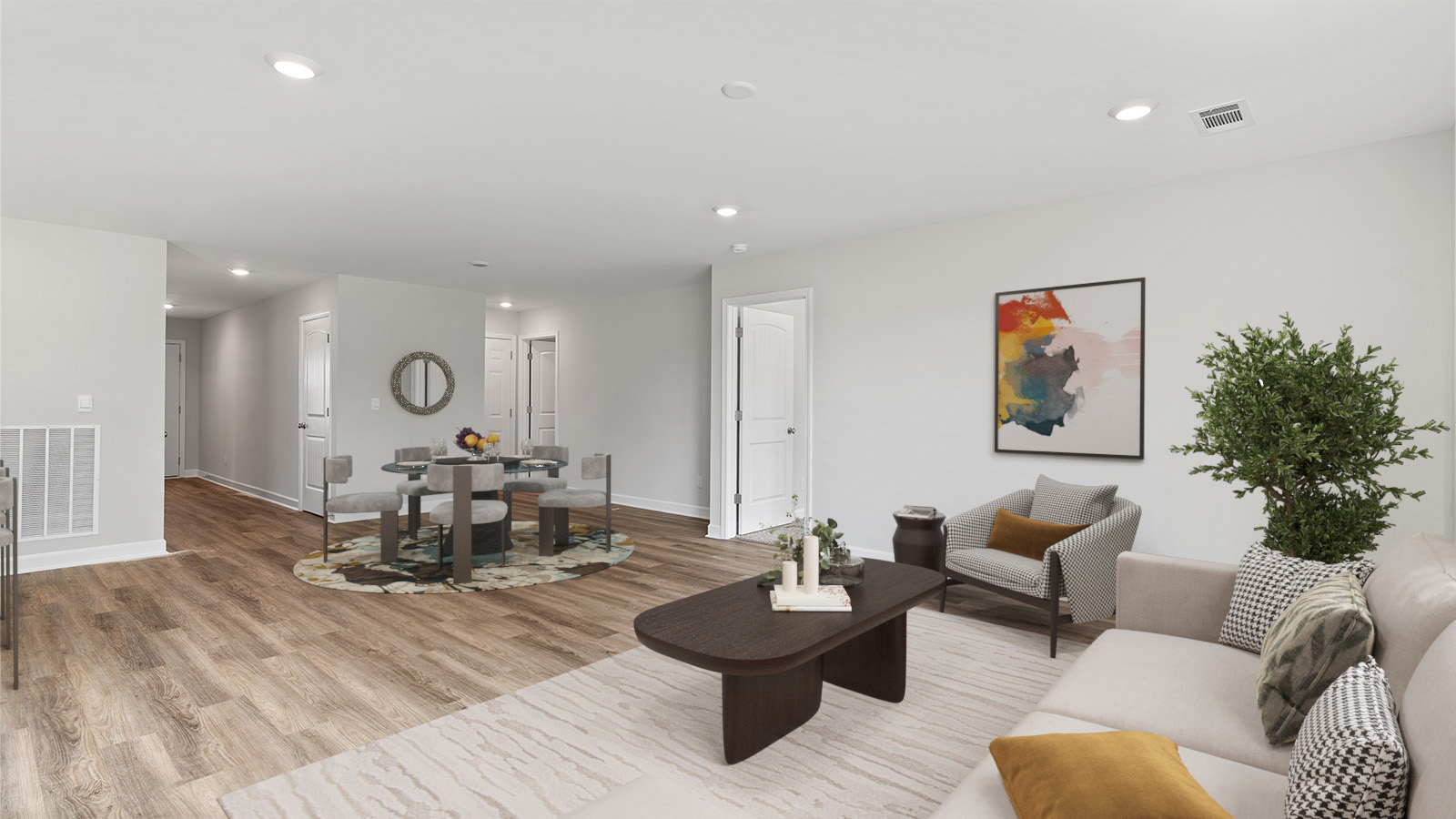 Seamless kitchen to living flow with luxury vinyl plank floors