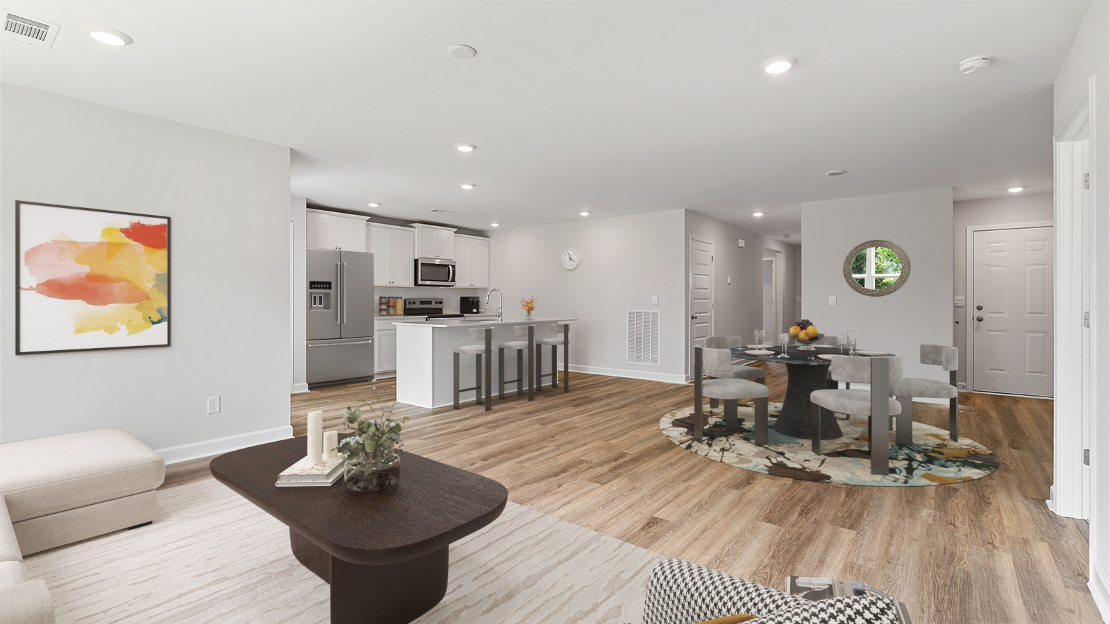 Seamless kitchen to living flow with luxury vinyl plank floors