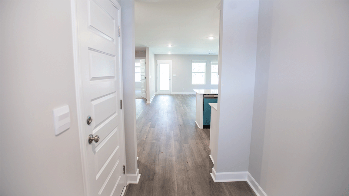 The Ozark floorplan with LVP flooring, quartz countertops, and SmartHome technology.
