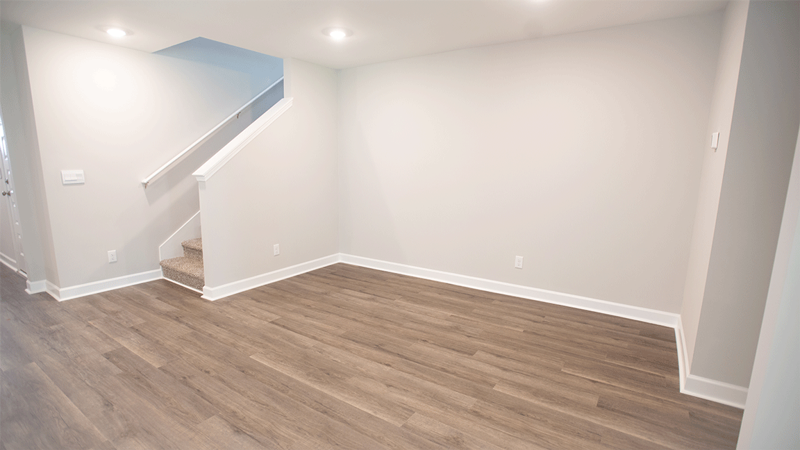 The Opelika floorplan interior image with LVP flooring and quartz countertops