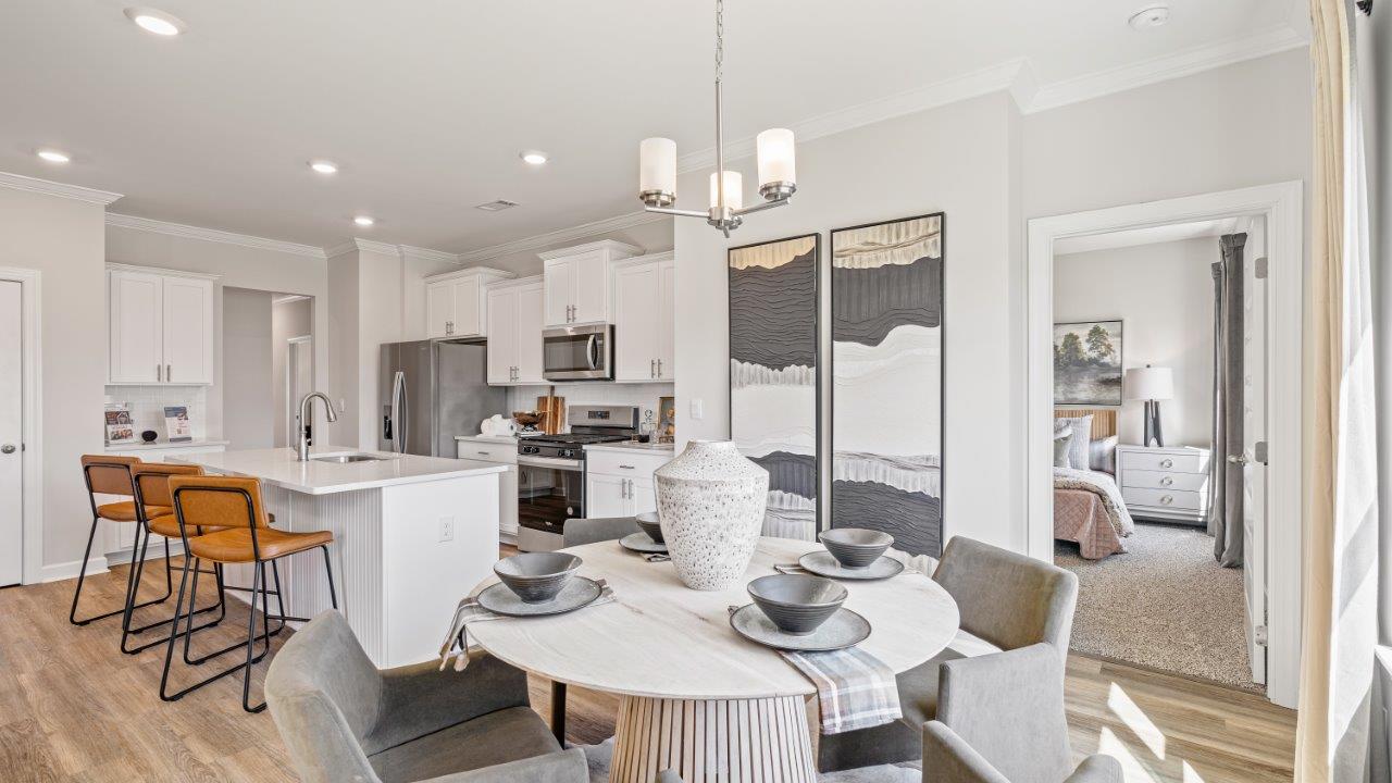 Avery floorplan dining space in Willow Point community Open‑concept Avery kitchen design by D.R. Horton