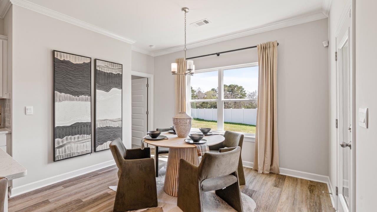 Avery floorplan dining space in Willow Point community Open living space in the Avery home by D.R. Horton