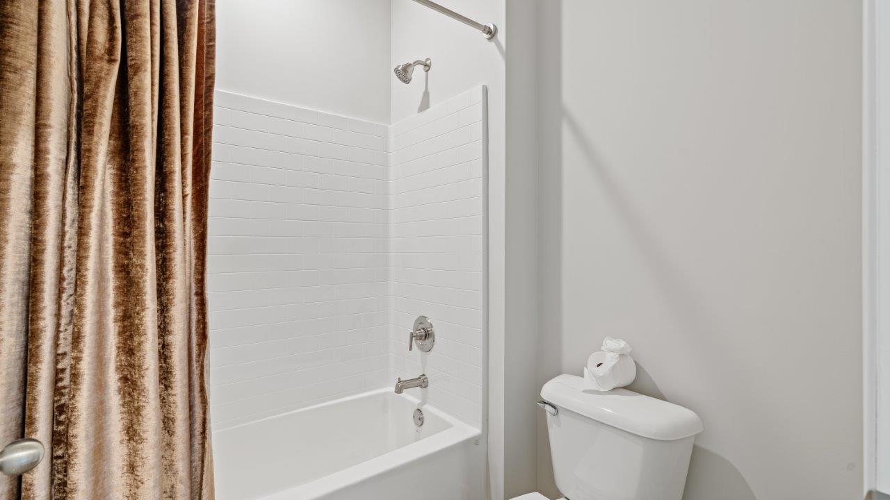 Avery floorplan space in Willow Point community spacious bedroom bathroom combo in the Avery by D.R. Horton