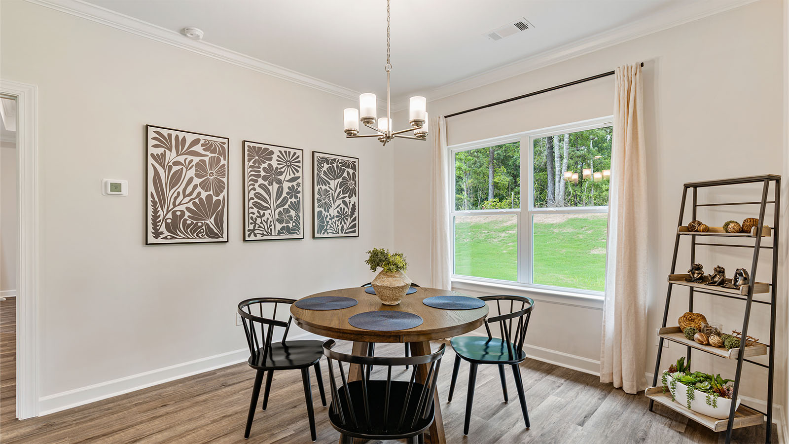 The Camden floorplan kitchen with quartz countertops, soft close cabinets, and LVP flooring
