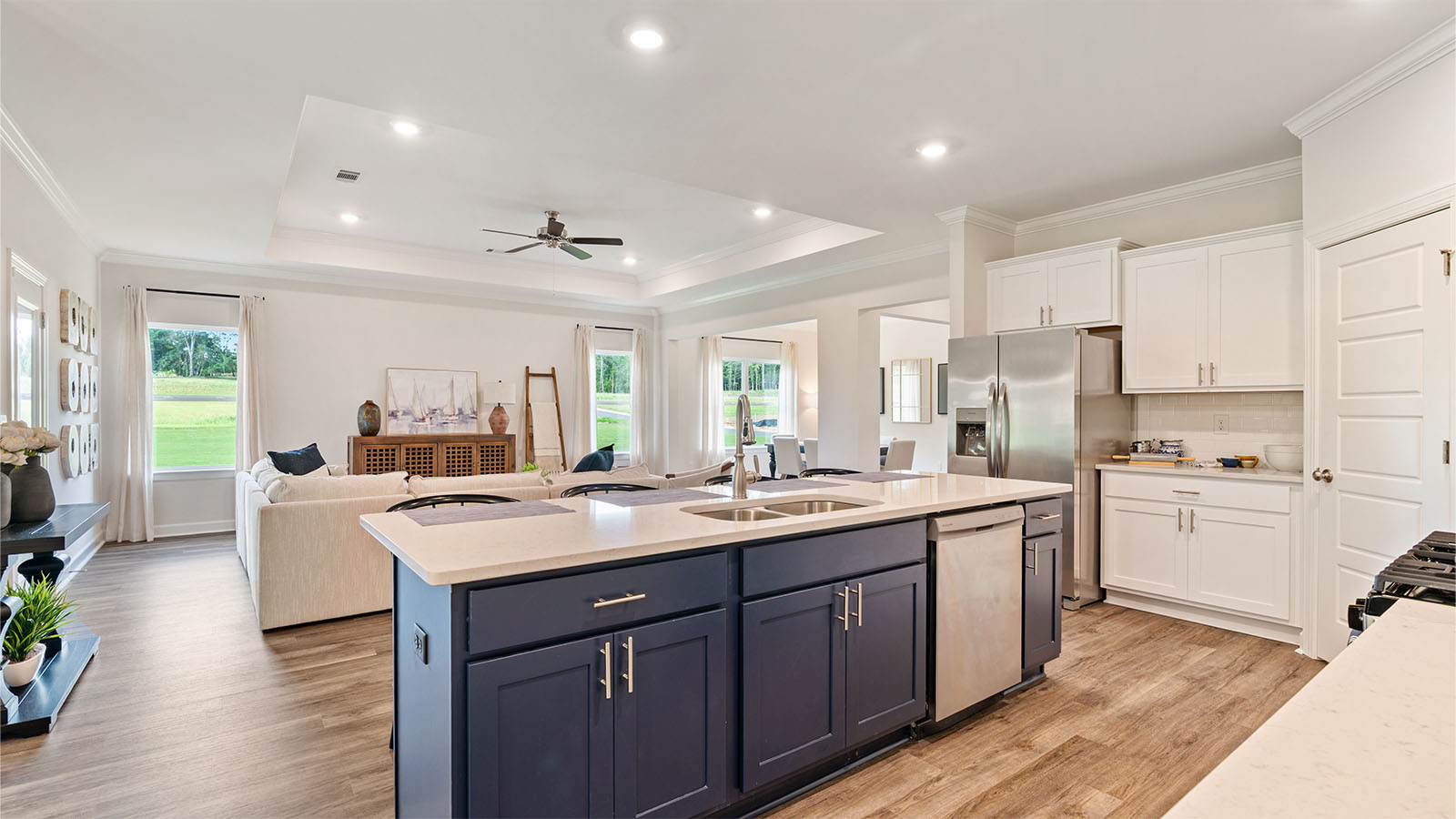 The Camden floorplan kitchen with quartz countertops, soft close cabinets, and LVP flooring