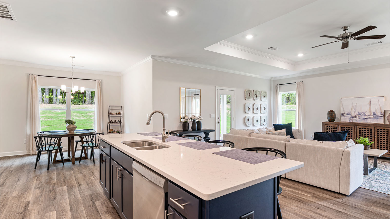 The Camden floorplan kitchen with quartz countertops, soft close cabinets, and LVP flooring