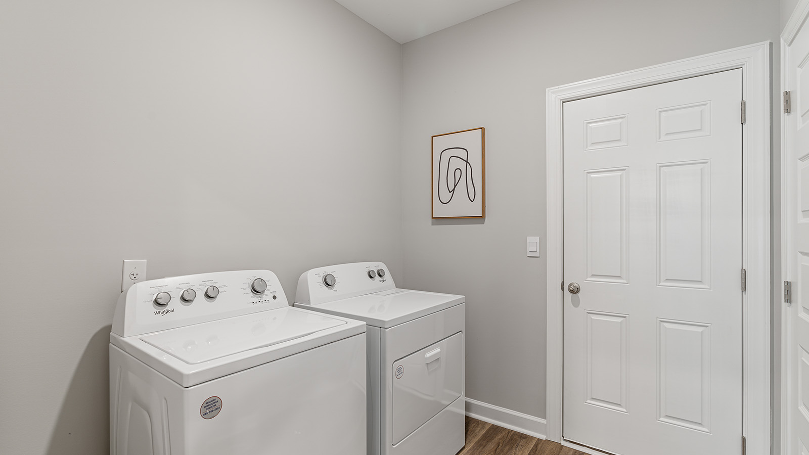 laundry room with luxury vinyl plank flooring