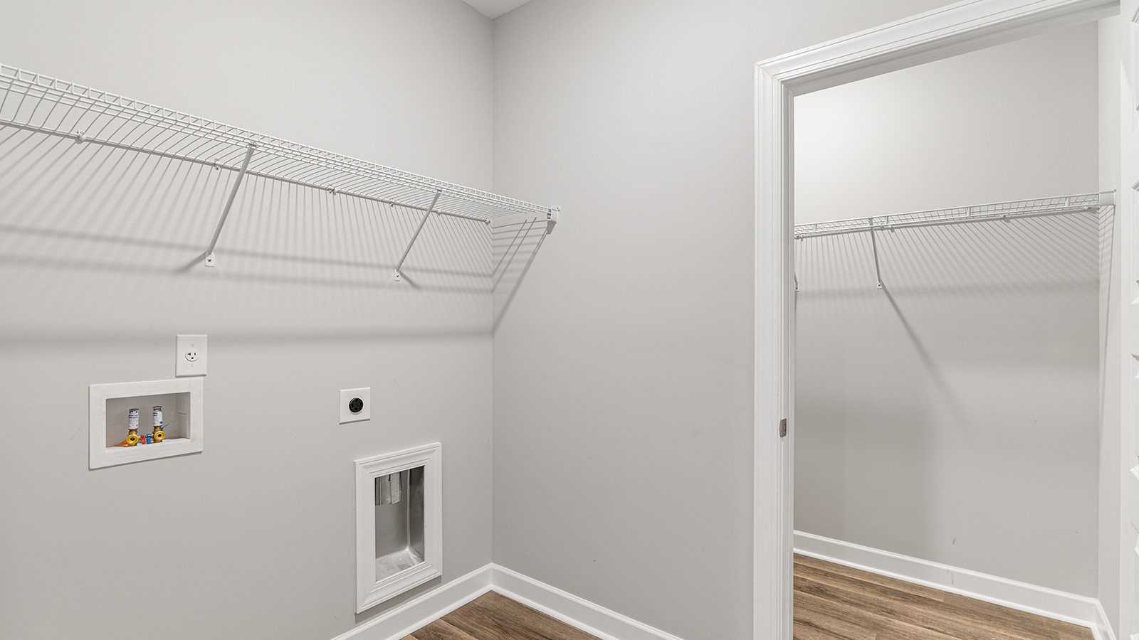 laundry room with luxury vinyl plank flooring