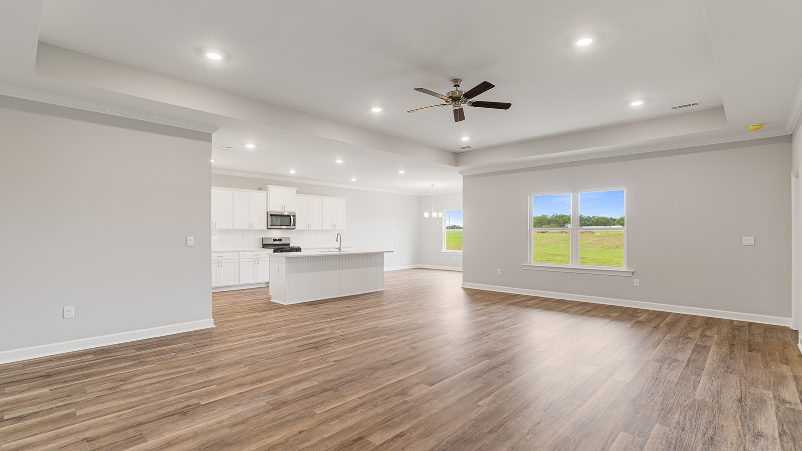 The Hawthorne floorplan kitchen with quartz countertops, soft close cabinets, and LVP flooring