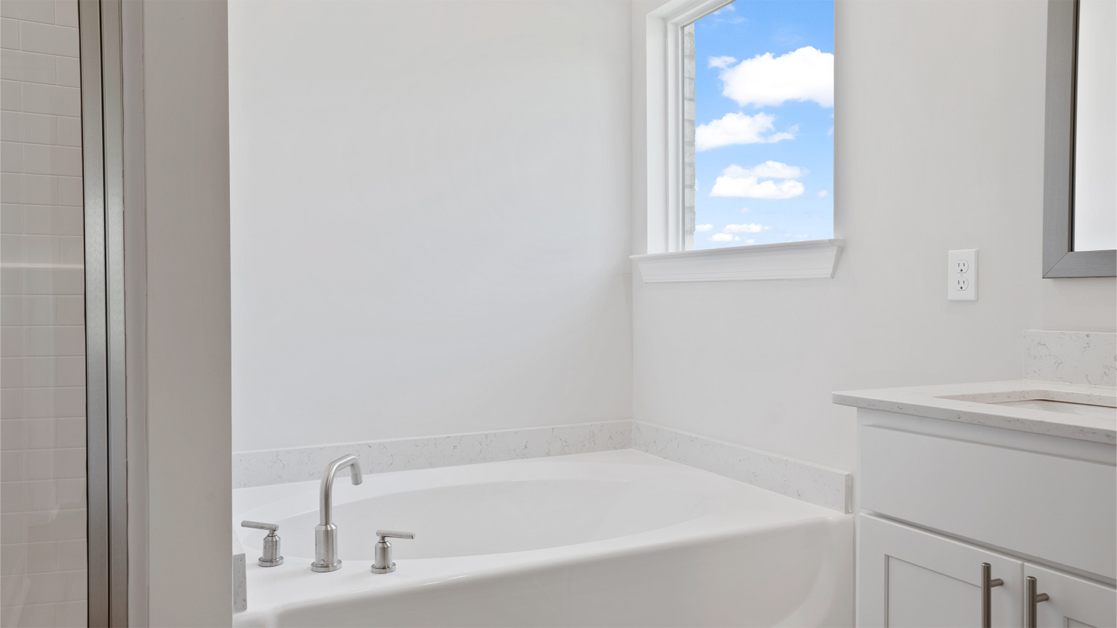 luxury vinyl plan flooring in bathrooms with quartz countertops