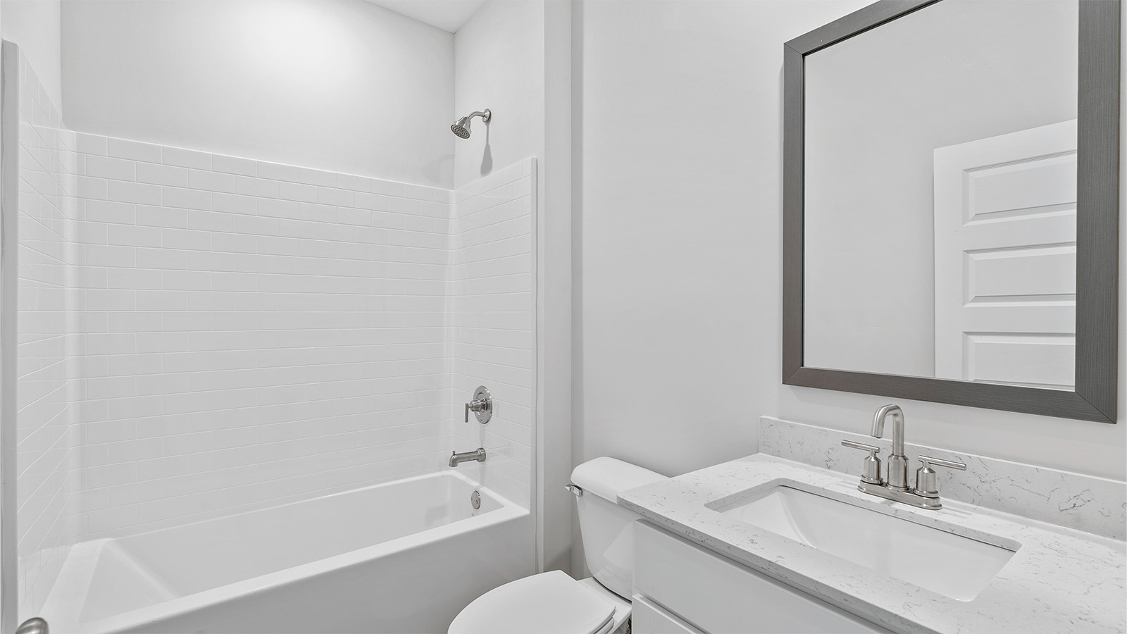 luxury vinyl plan flooring in bathrooms with quartz countertops