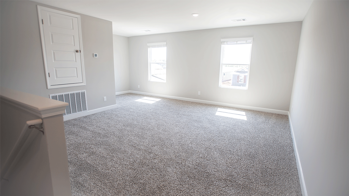 The Oxford floorplan living space with carpet