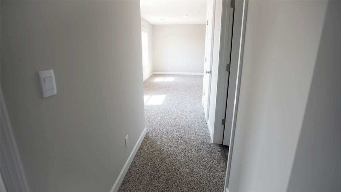 The Oxford floorplan bathroom with LVP flooring and quartz countertops