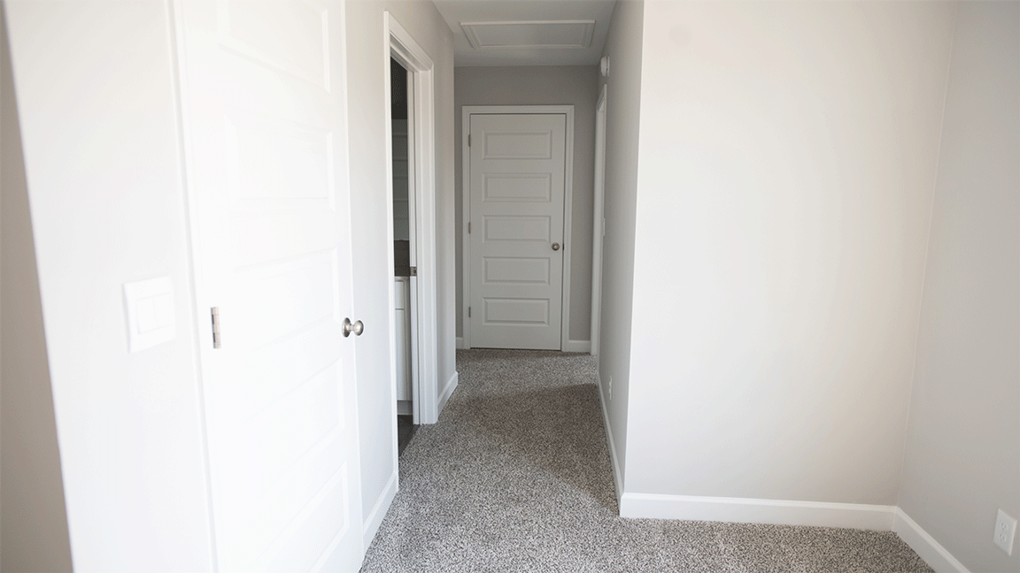 The Oxford floorplan bathroom with LVP flooring and quartz countertops