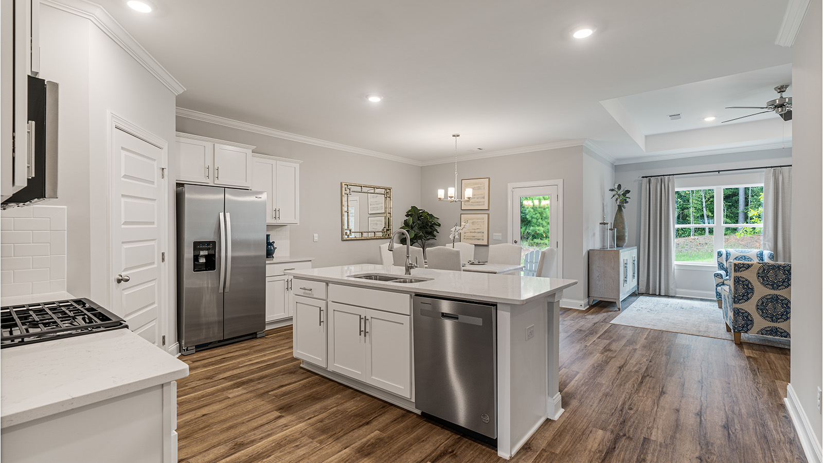 Rhett floorplan with quartz countertops, soft close cabinets, and LVP flooring